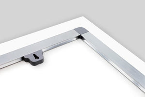 This hanging kit consists of an aluminium profile with corner caps. The profile will be attached to the entire plate. This ensures that the plate is no longer flexible and it becomes extra solid.